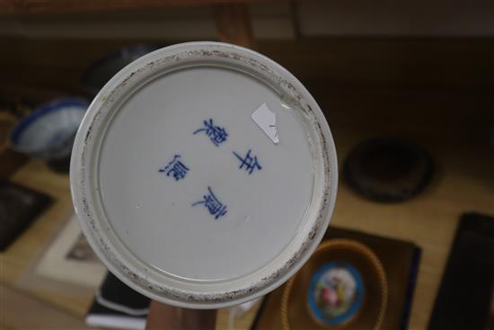 A Chinese blue and white jardiniere, Kangxi mark, and a similar vase, 20.5cm with hardwood stand